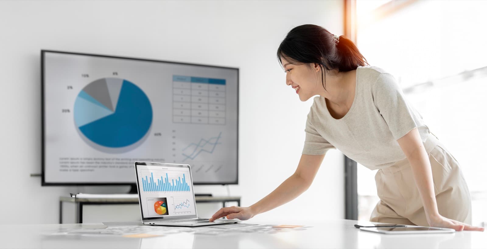 Analyst reviewing dashboards and reports so AI has clean data to work from