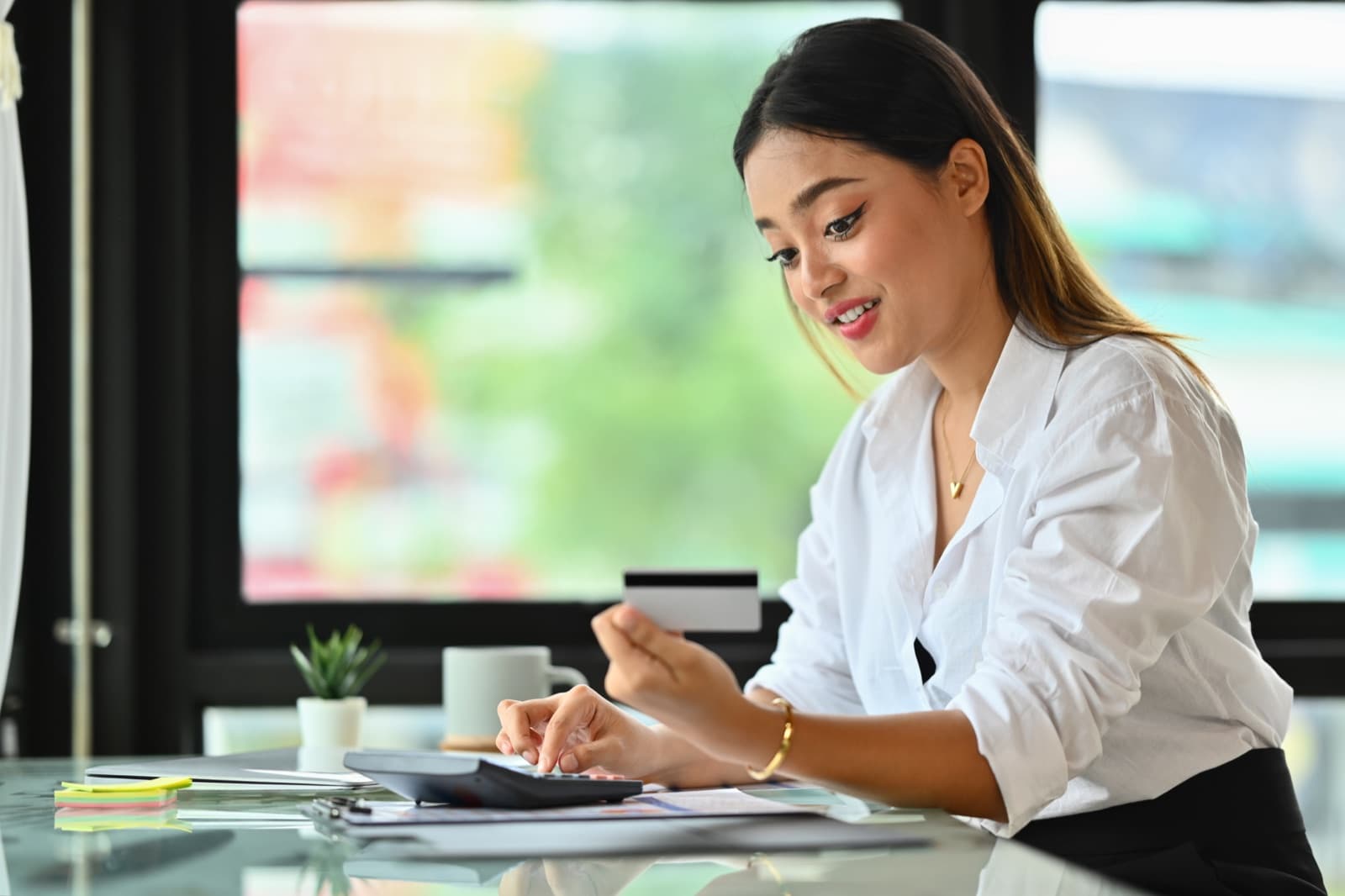 Billing specialist matching a card payment to an invoice
